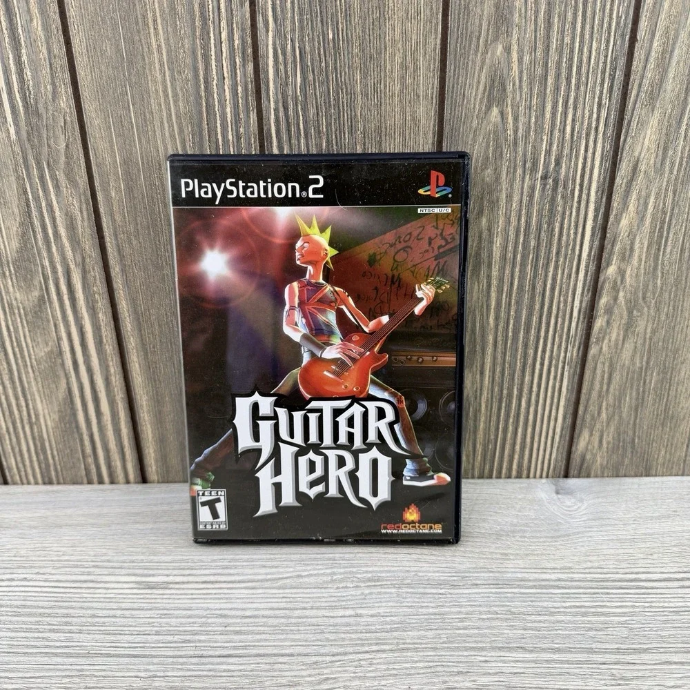 Guitar Hero (Sony PlayStation 2, 2006) Complete With Manual